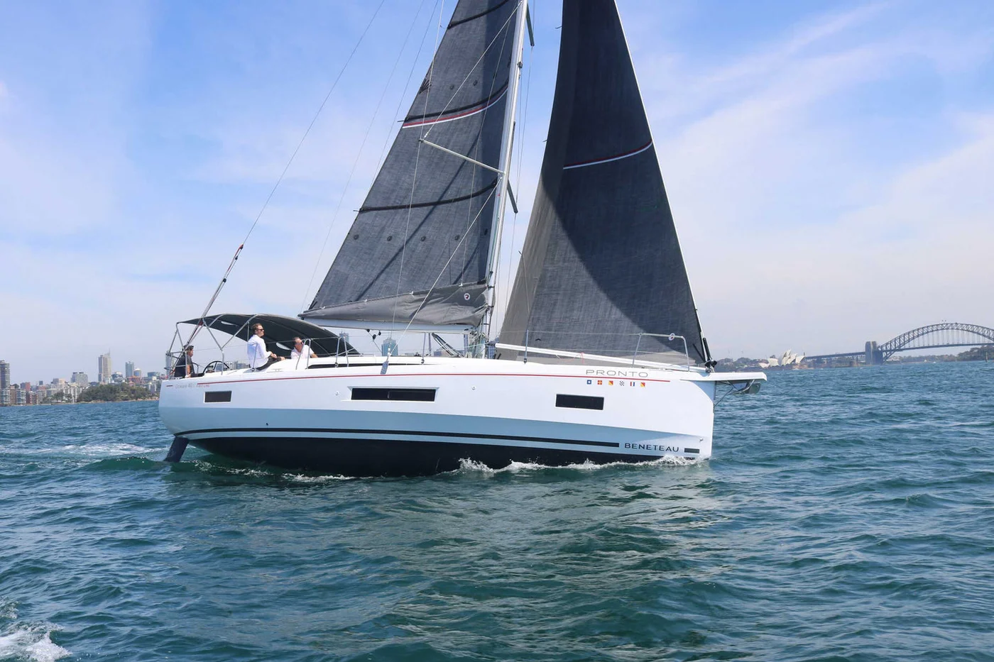 Yacht Pronto sailing on Sydney Harbour with Rolly Tasker sails
